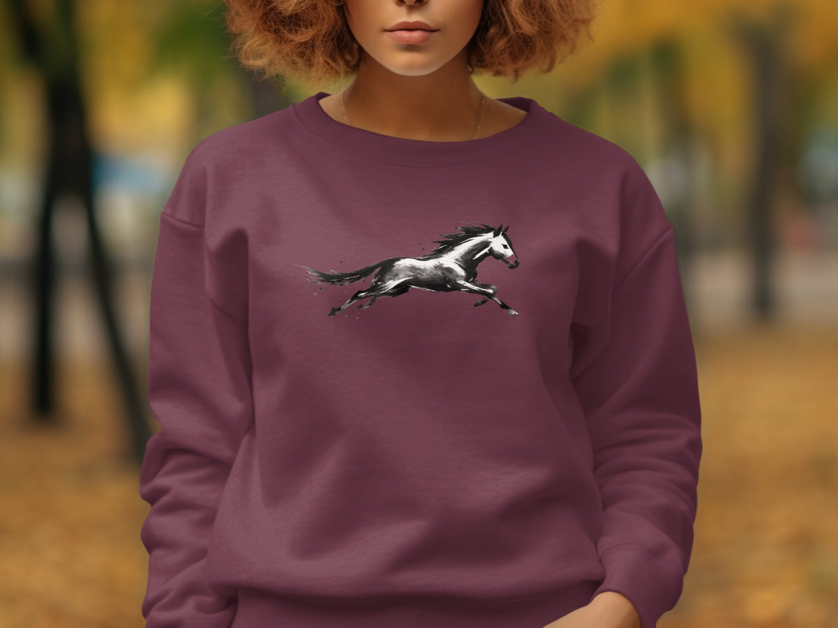 Maroon sweatshirt with a black and white running horse graphic on the chest.