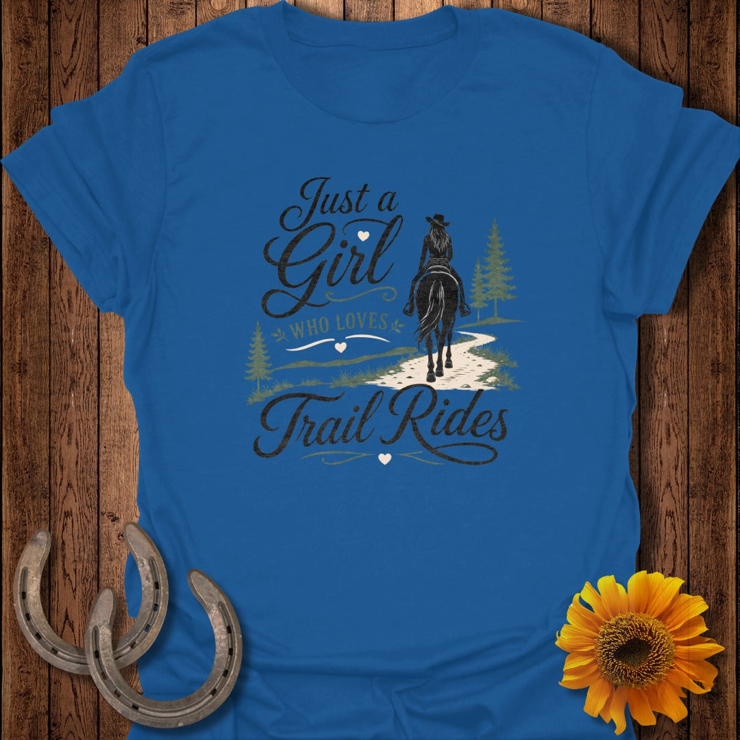 Blue t-shirt with "Just a Girl Who Loves Trail Rides" text and horse rider illustration.