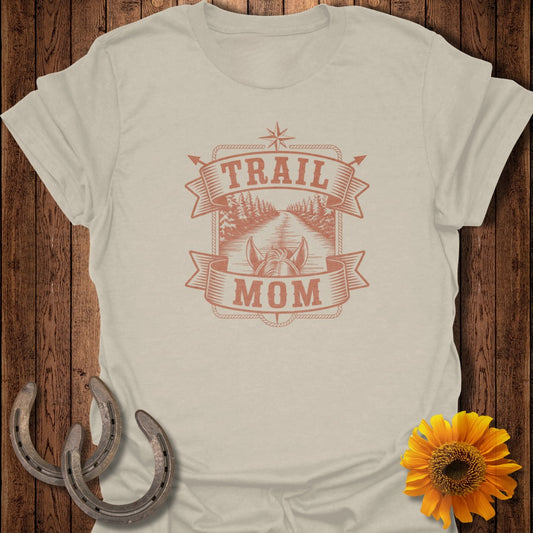 Trail Mom graphic on a light tan t-shirt with horseshoes and sunflower.