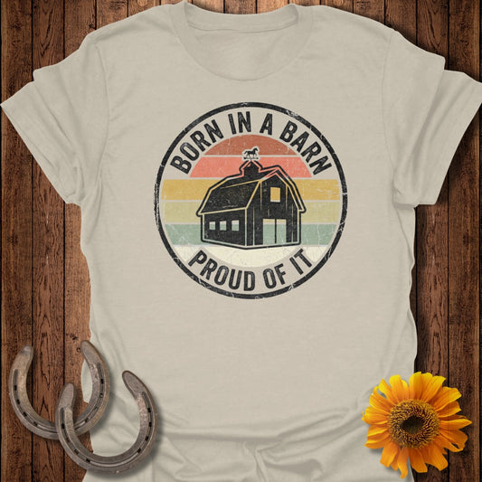 T-shirt graphic with "Born in a Barn, Proud of It" text and barn illustration.