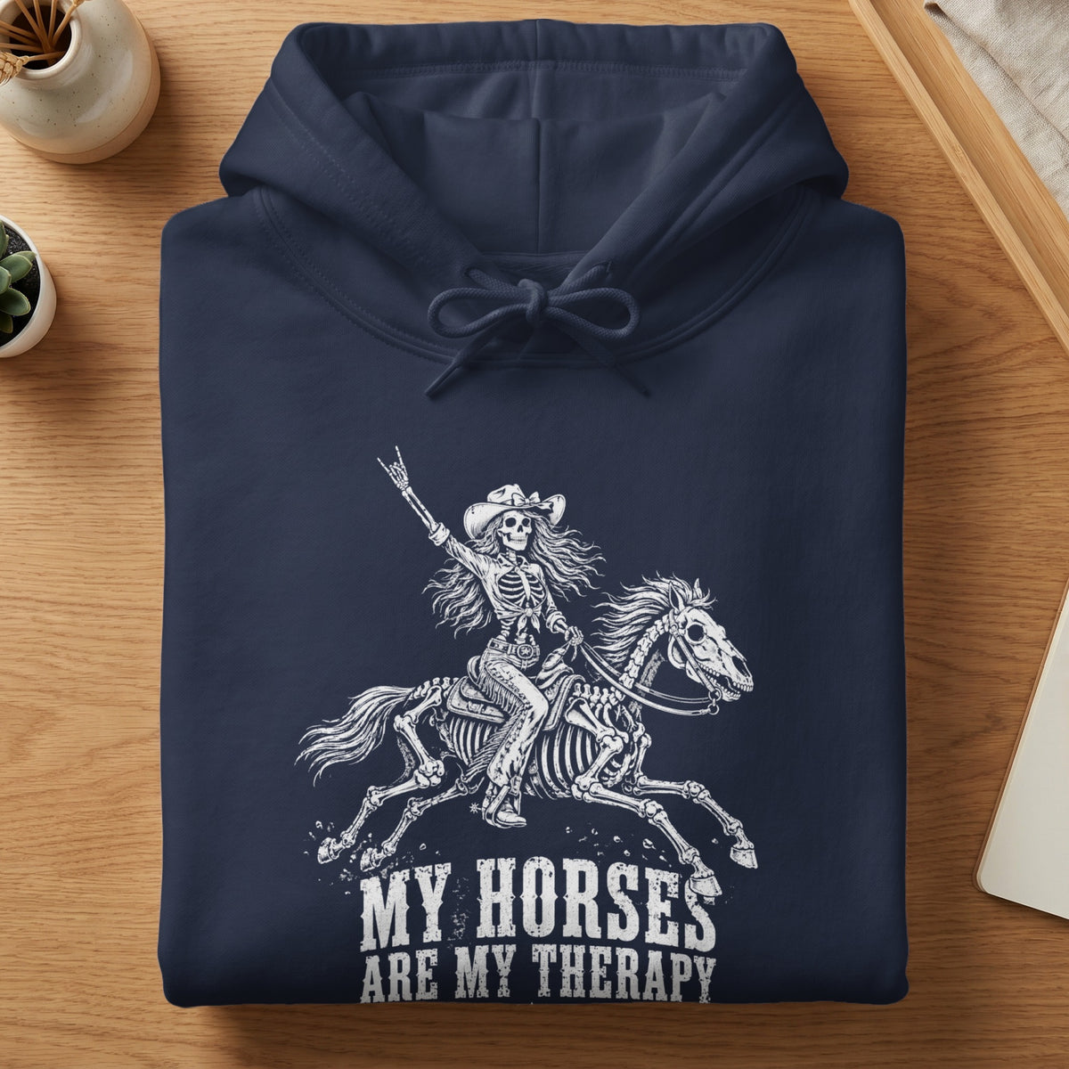 Navy hoodie with skeleton rider on skeleton horse graphic and text "MY HORSES ARE MY THERAPY".