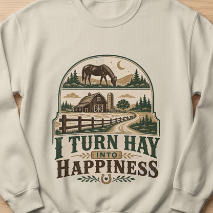 Sweatshirt with a farm scene and text "I TURN HAY INTO HAPPINESS"