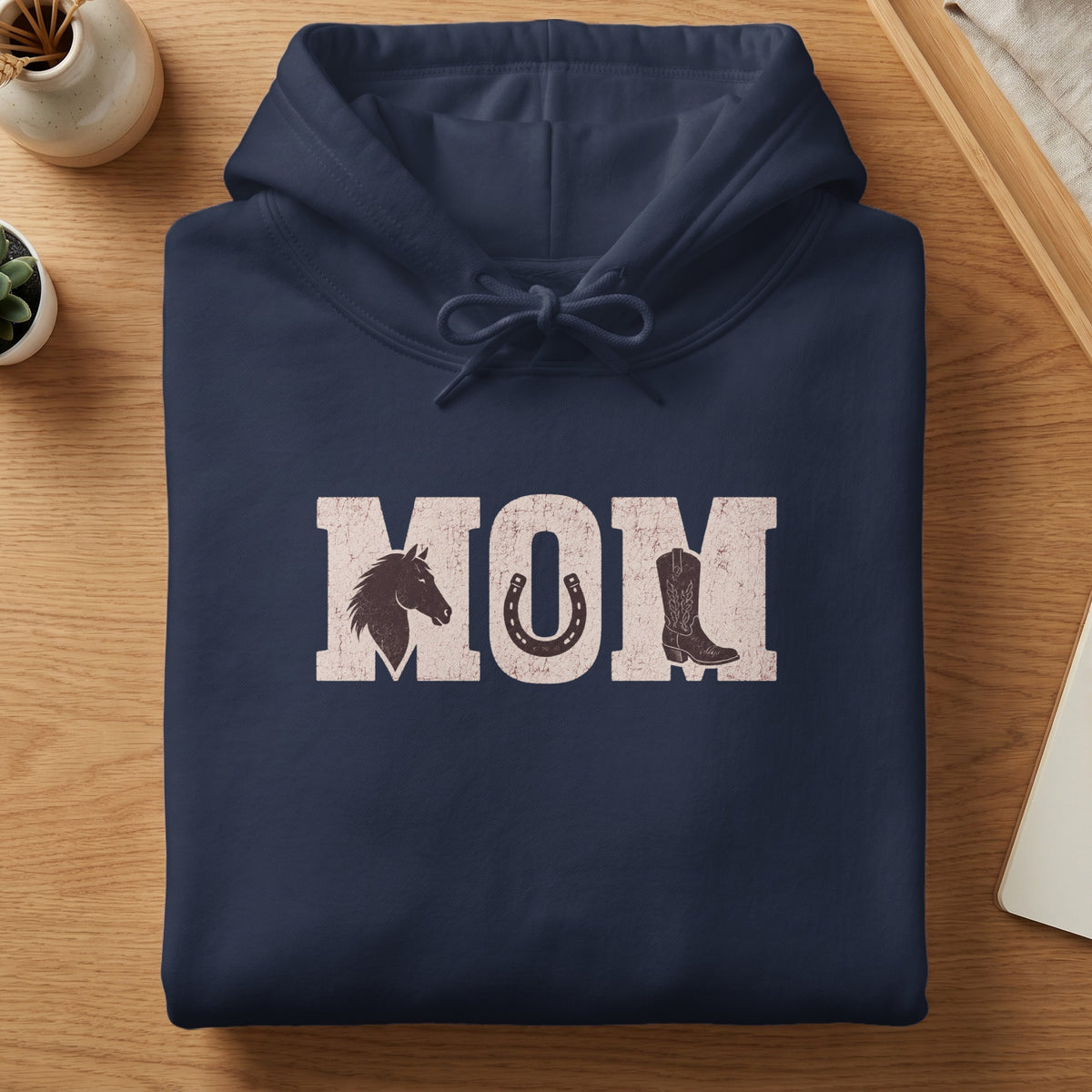 Navy hoodie with distressed "MOM" graphic featuring horse, horseshoe, and cowboy boot.