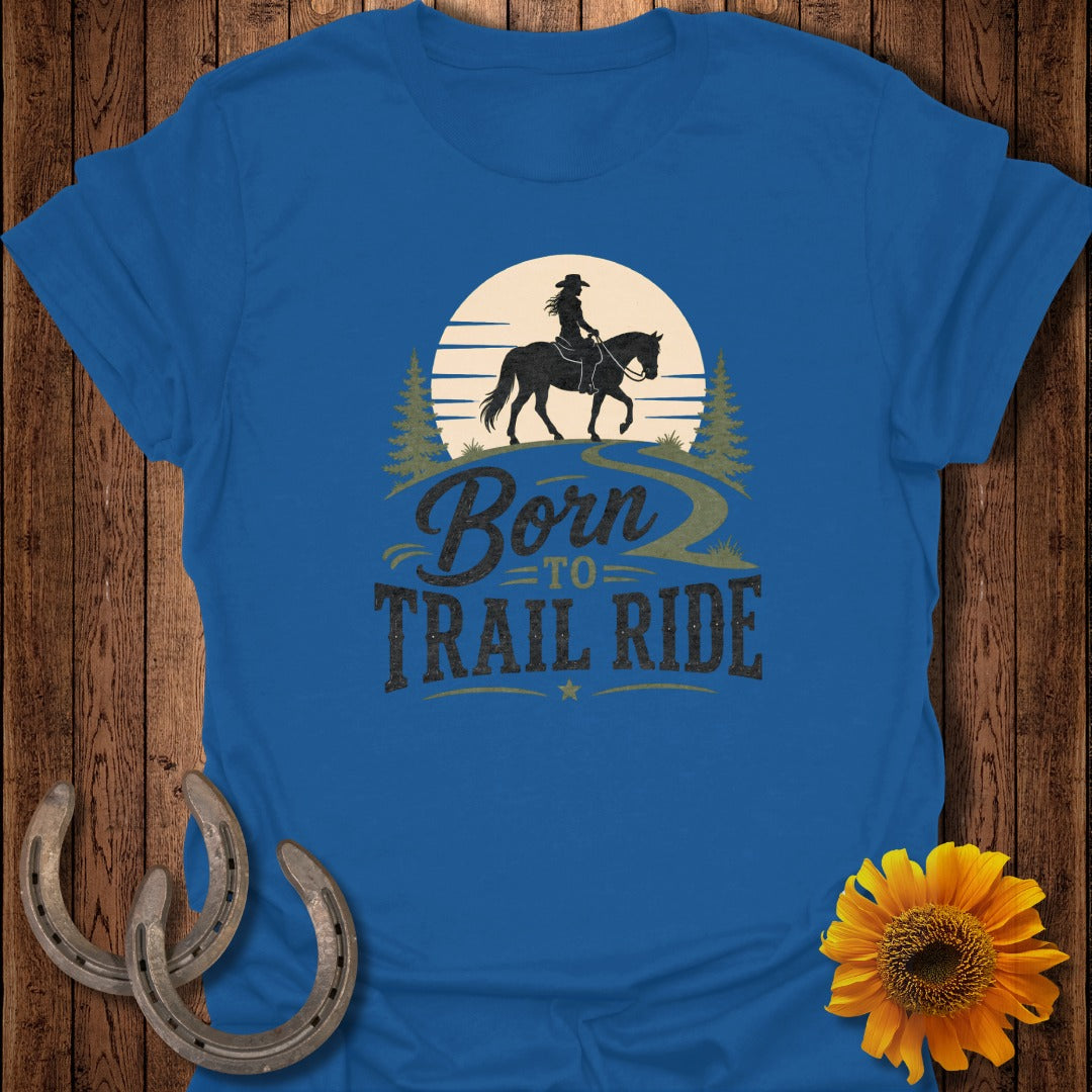 Blue t-shirt with "Born to Trail Ride" text and horseback rider silhouette.