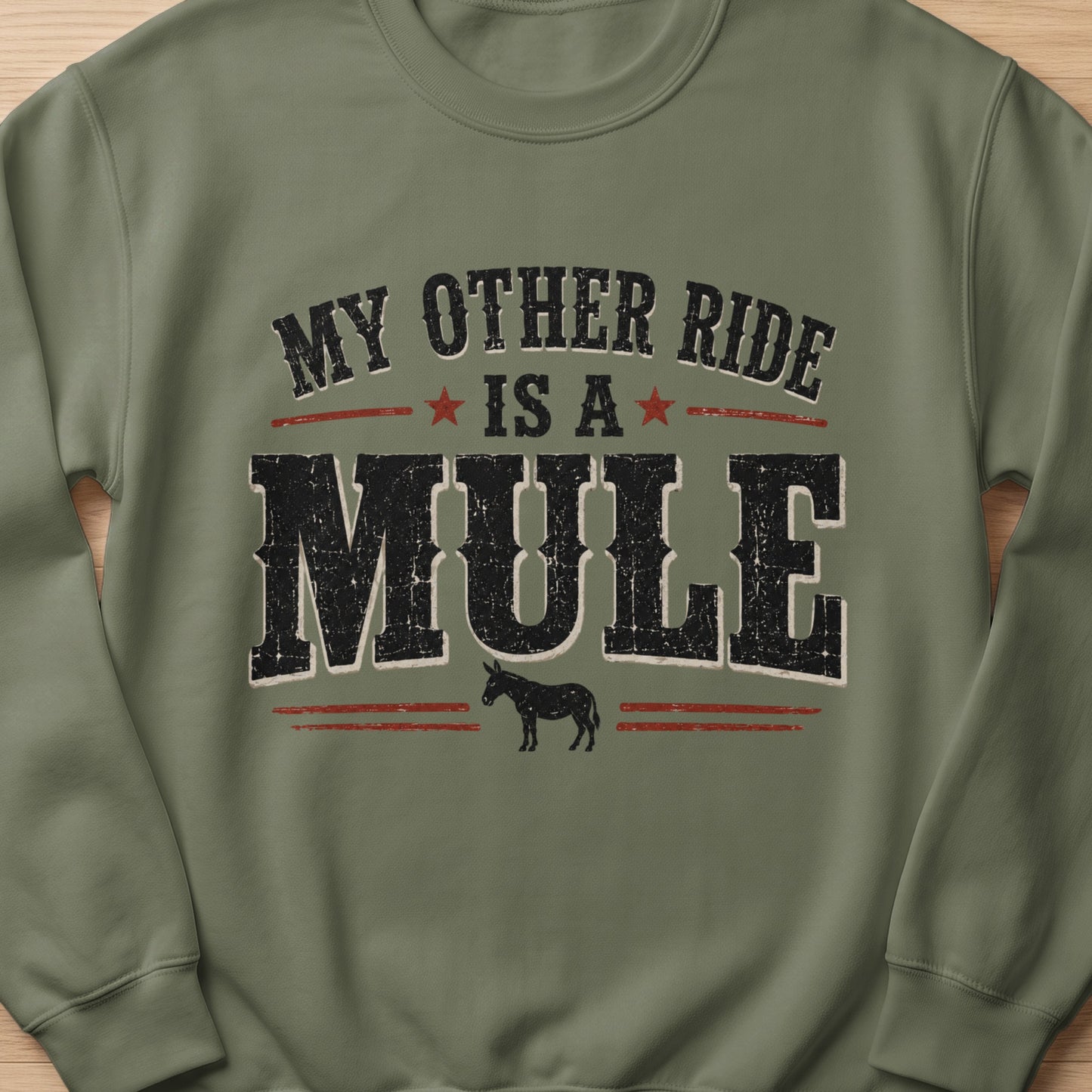 Olive green sweatshirt with distressed text and a mule graphic.