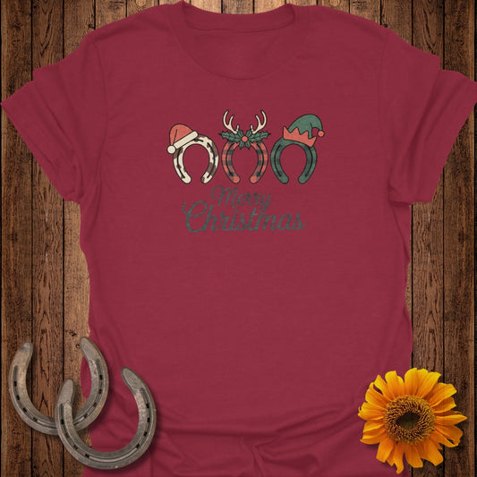 Maroon t-shirt with three festive horseshoes and "Merry Christmas" text.