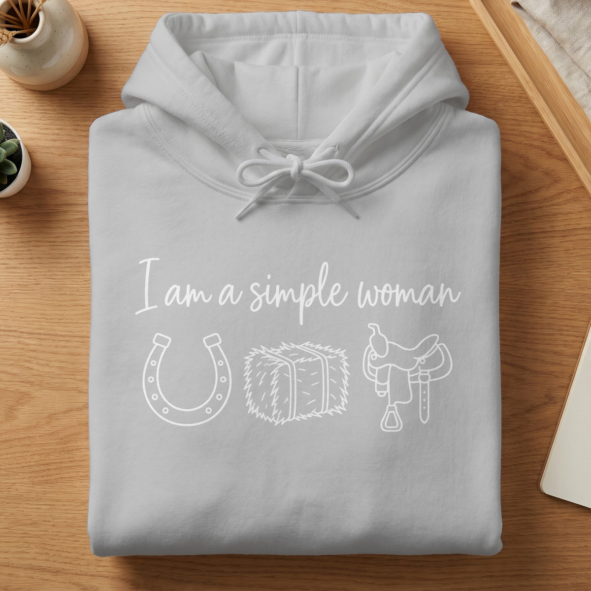 Grey hoodie with text "I am a simple woman" and horse-themed icons.