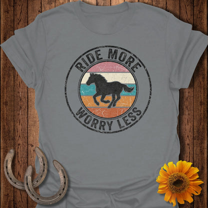Grey t-shirt with "Ride More Worry Less" circular graphic and horse silhouette.