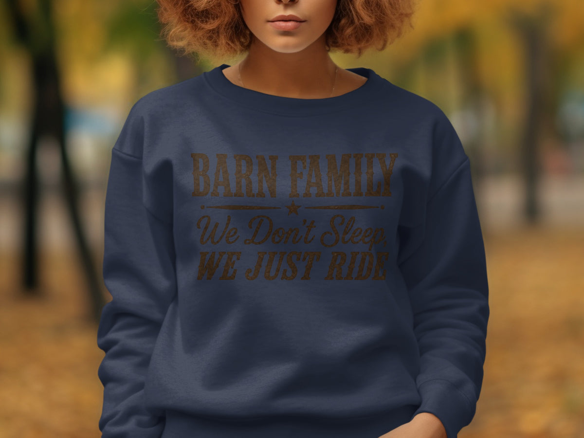 Navy sweatshirt with "BARN FAMILY We Don't Sleep WE JUST RIDE" text.