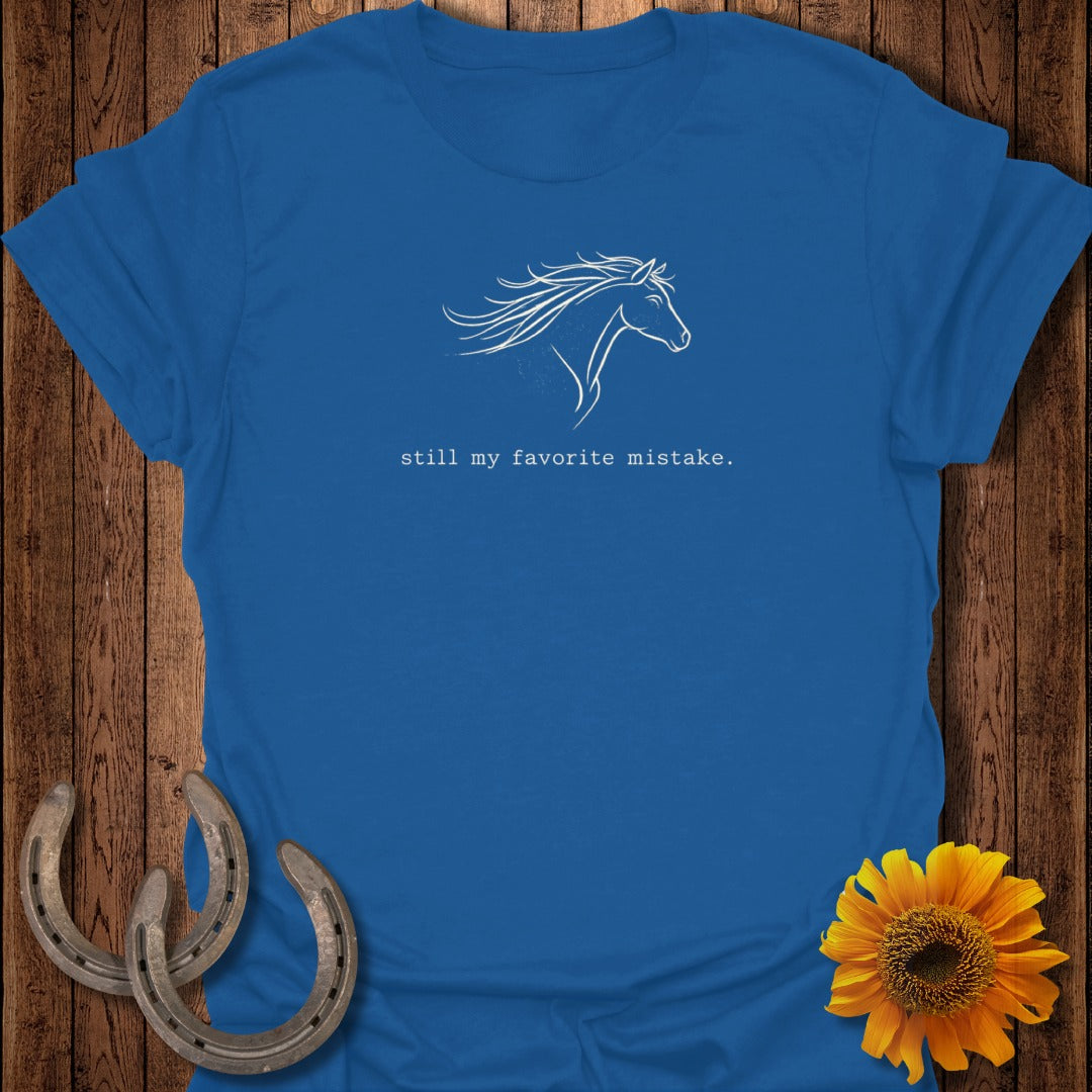 Blue t-shirt with white abstract horse and text "still my favorite mistake."