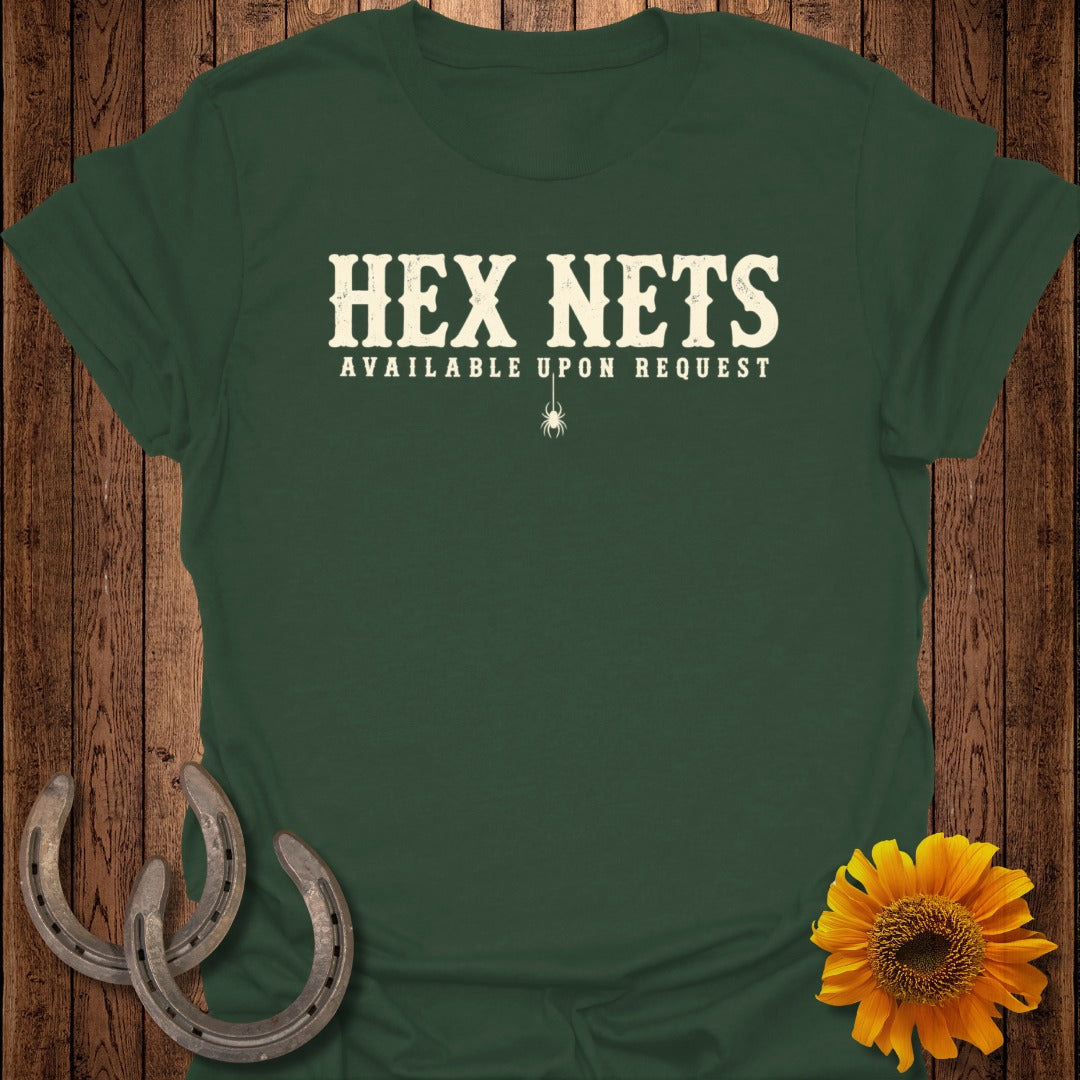 Dark green t-shirt with white text "HEX NETS AVAILABLE UPON REQUEST" and a small spider.