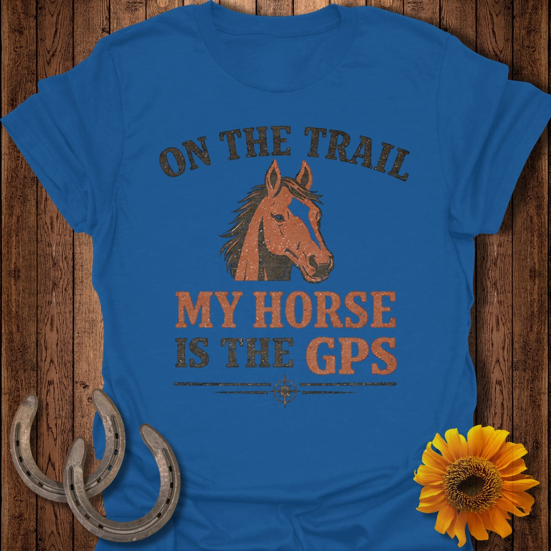 Blue t-shirt with "ON THE TRAIL MY HORSE IS THE GPS" and a horse graphic.