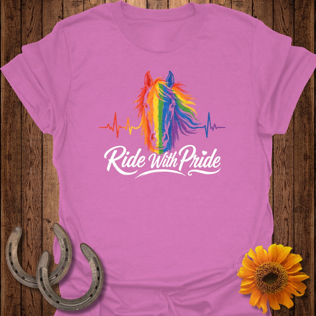 Pink t-shirt with colorful horse and "Ride With Pride" text.