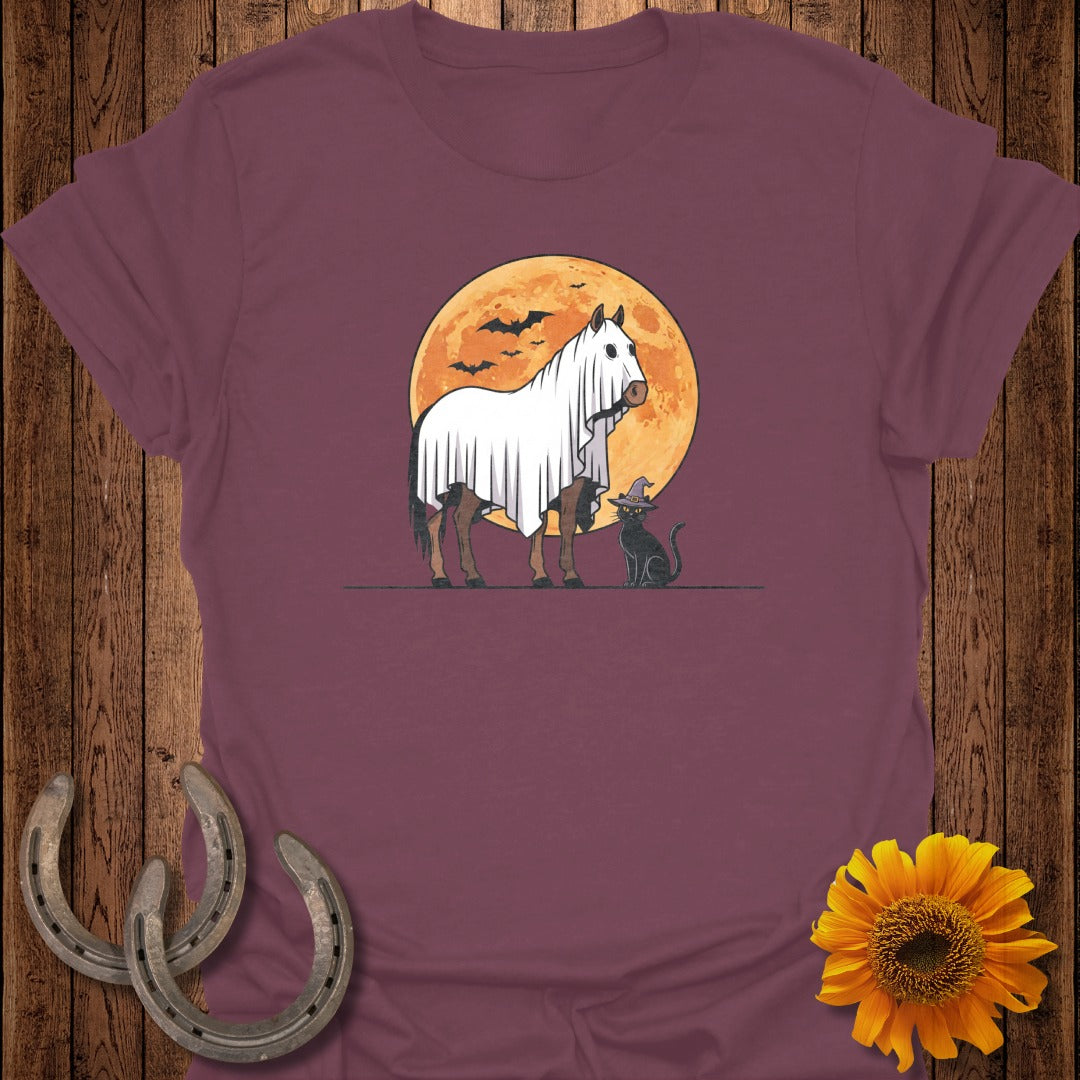 Horse in a ghost costume with cat and bats against a full moon.