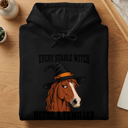 Black hoodie with a horse wearing a witch hat and text.