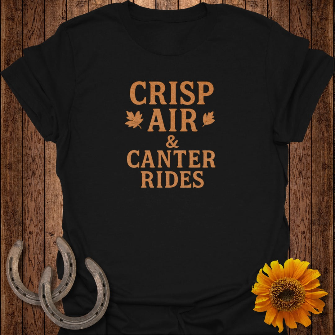 Black t-shirt with text "CRISP AIR & CANTER RIDES" and autumn graphics.