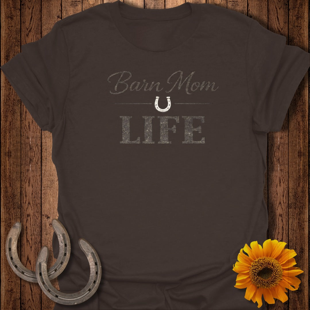 Brown t-shirt with distressed text "Barn Mom LIFE" and a horseshoe graphic.