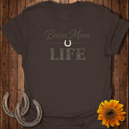 Brown t-shirt with distressed text "Barn Mom LIFE" and a horseshoe graphic.