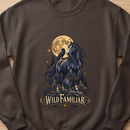 Dark horse with crow on its back, full moon, trees, and text "WILD FAMILIAR".