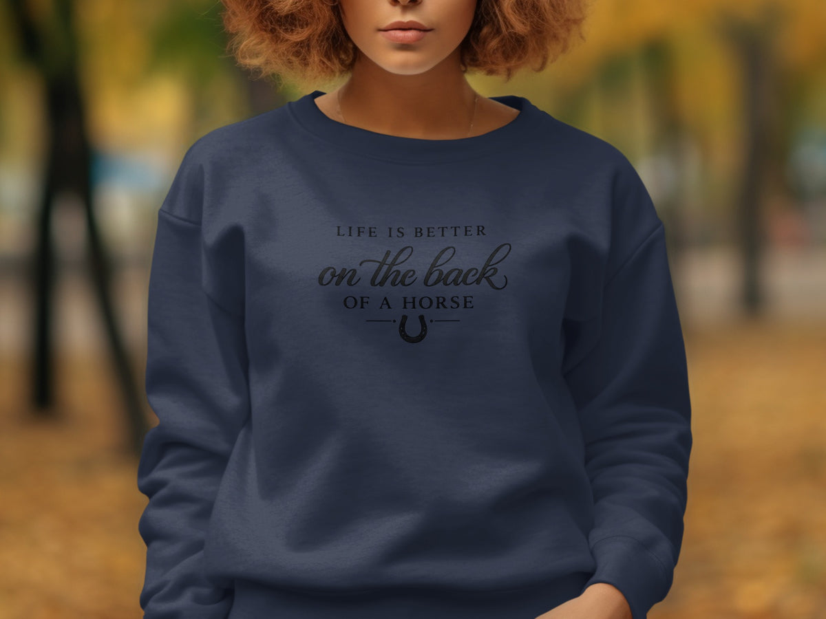 Navy sweatshirt with text "Life is Better on the Back of a Horse" and a horseshoe.