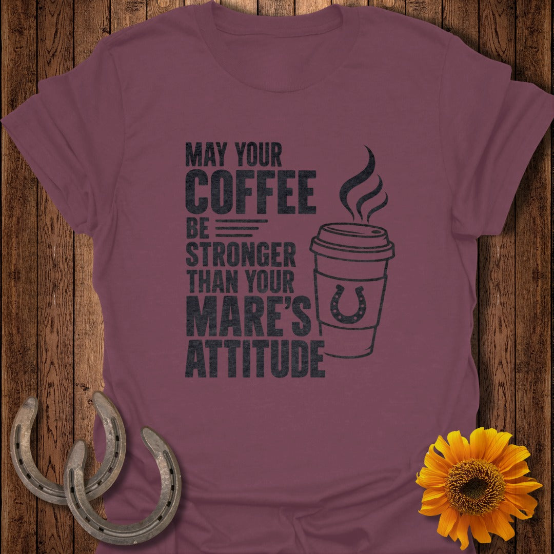 Maroon t-shirt with text "May your coffee be stronger than your mare's attitude" and coffee cup icon.