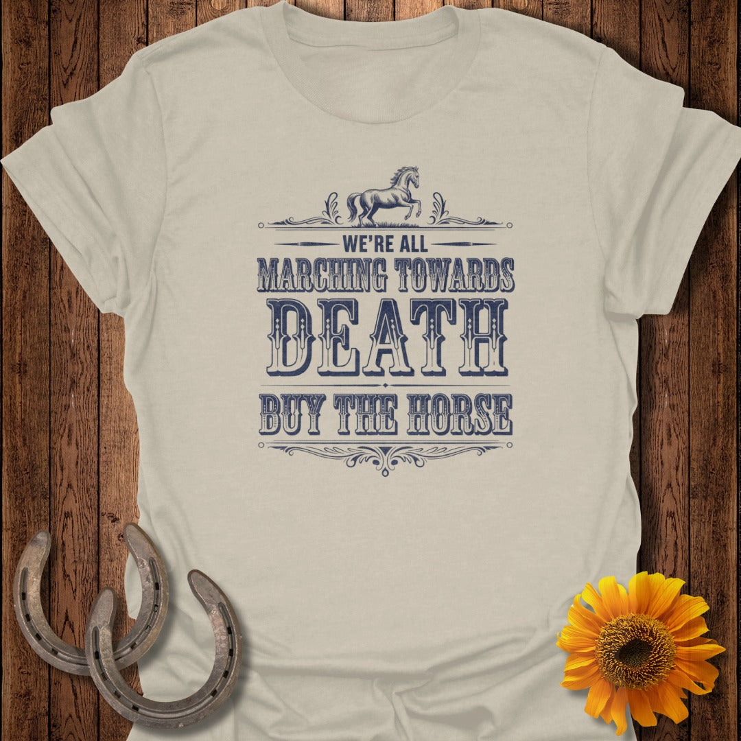 Light beige t-shirt with text "We're all marching towards death, buy the horse".