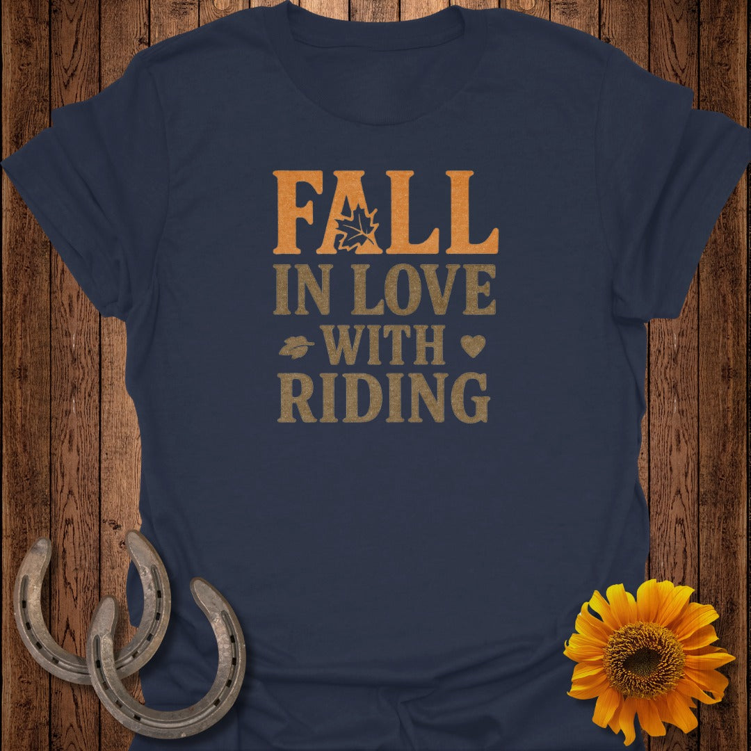 Navy t-shirt with text "FALL IN LOVE WITH RIDING" and autumn graphics.
