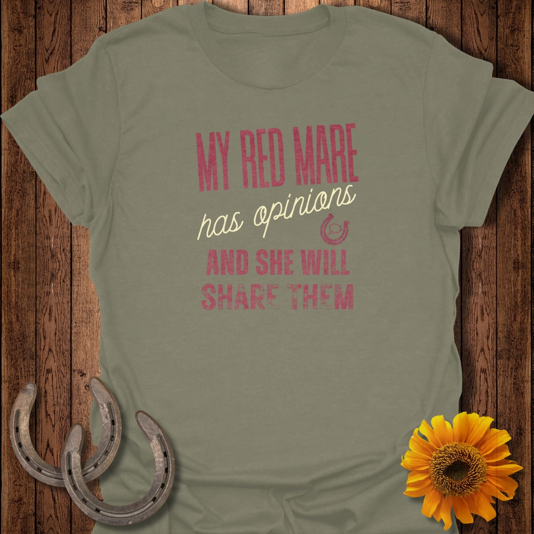 Green t-shirt with "My Mare Has Opinions and She Will Share Them" in pink text.