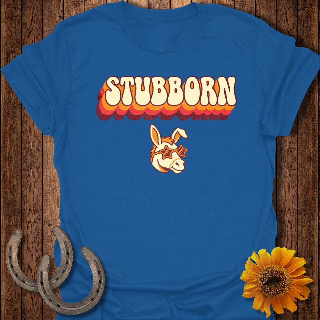 Blue t-shirt with "STUBBORN" and a donkey face wearing star sunglasses.