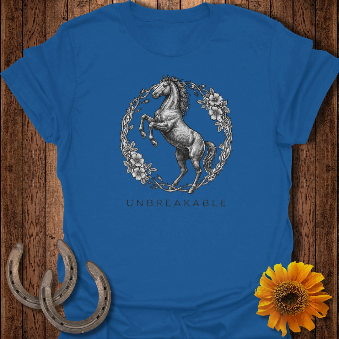 Horse with floral wreath graphic on a royal blue t-shirt.