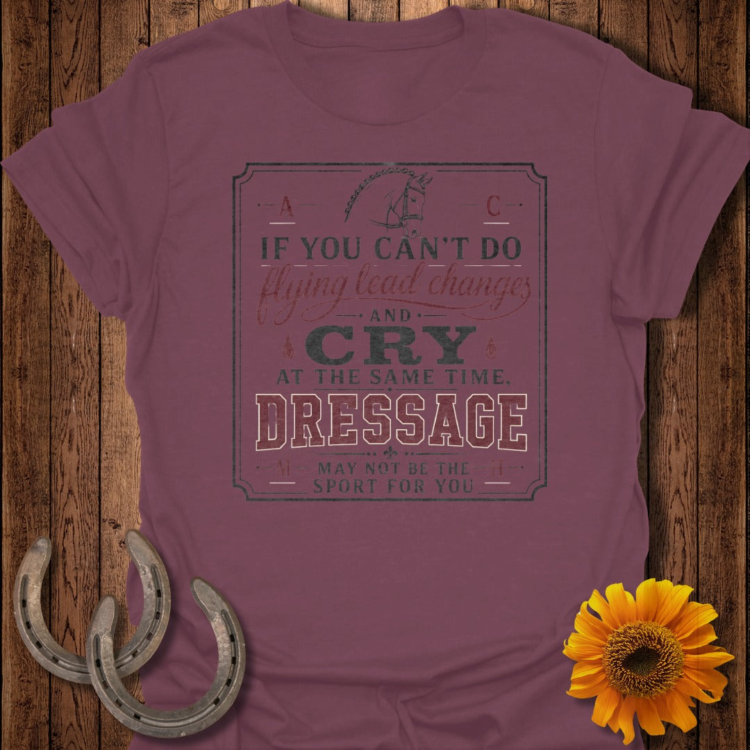 Maroon t-shirt with text about dressage, flying lead changes, and crying.