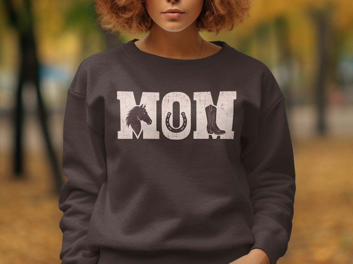 Dark gray sweatshirt with "MOM" text, horse head, horseshoe, and cowboy boot graphic.
