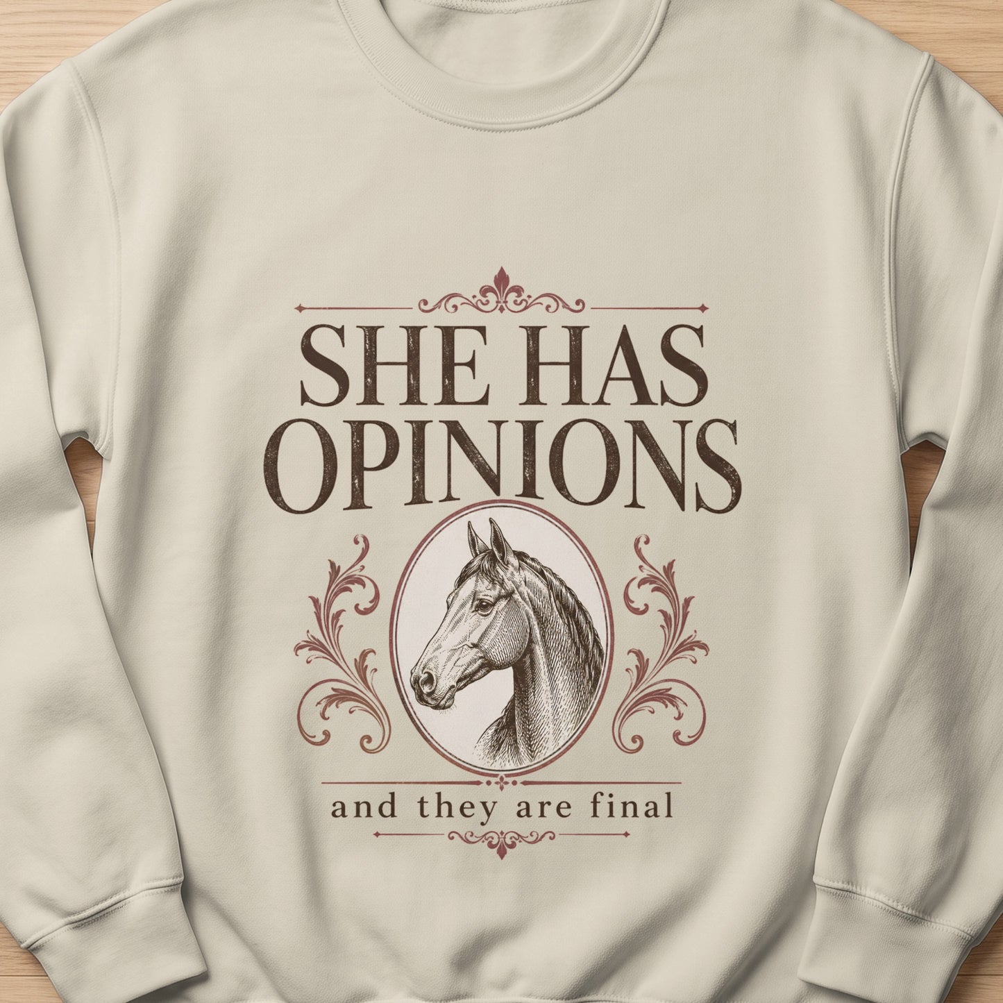 Cream sweatshirt with "She Has Opinions and They Are Final" and horse head graphic.