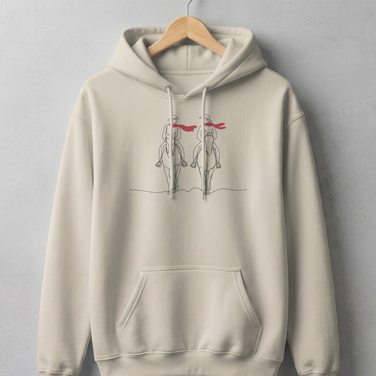 Beige hoodie with a minimalist line art graphic of two cowboys on horses.