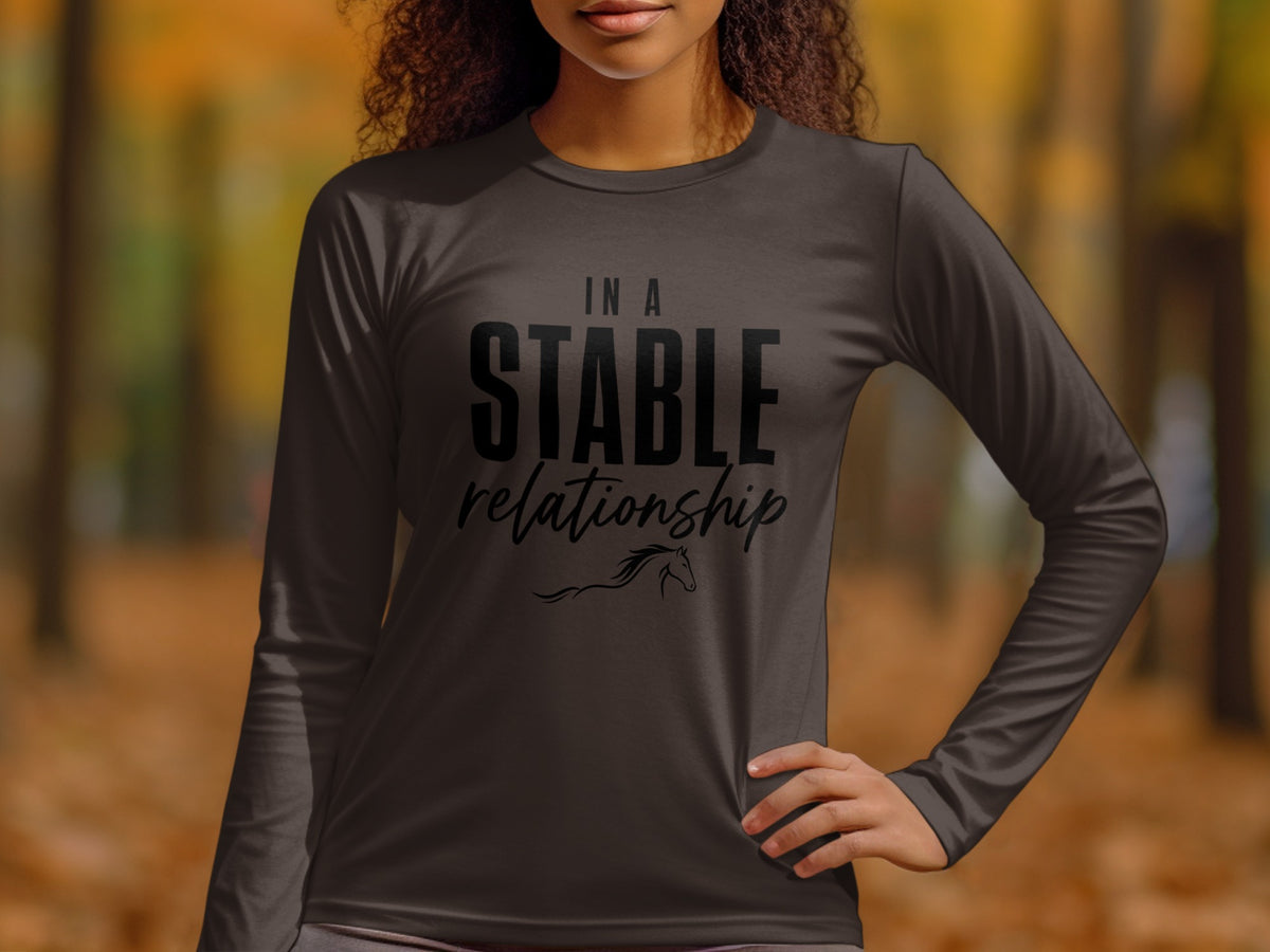 Dark long-sleeve shirt with "In a Stable Relationship" and horse graphic.