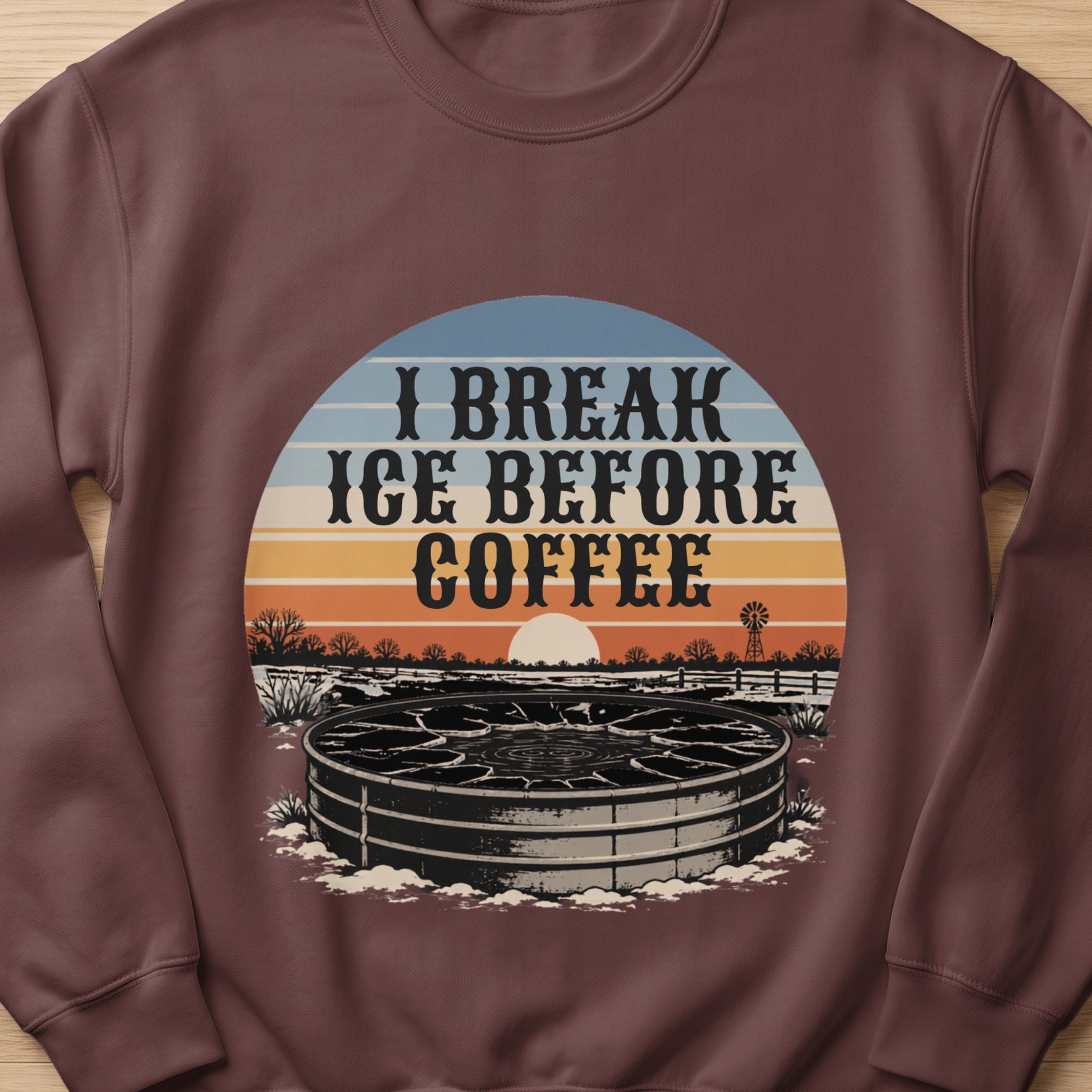 I Break Ice Before Coffee text over a winter farm scene with frozen water tank.