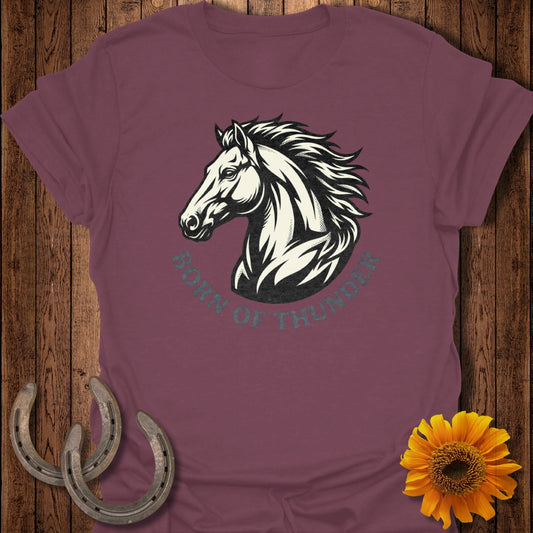 Burgundy t-shirt with a horse head design and text "Born in Thunder."