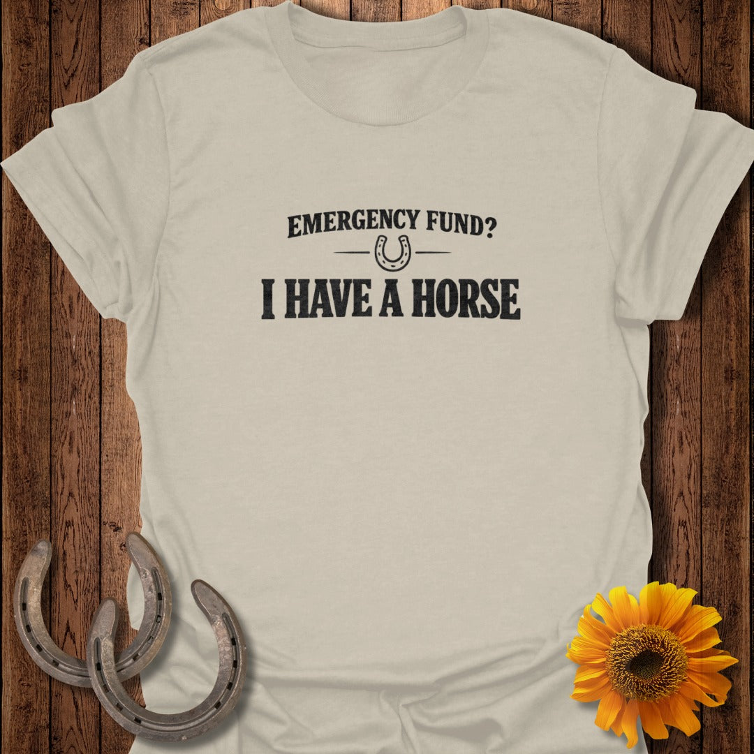 Light beige t-shirt with "EMERGENCY FUND? I HAVE A HORSE" text.