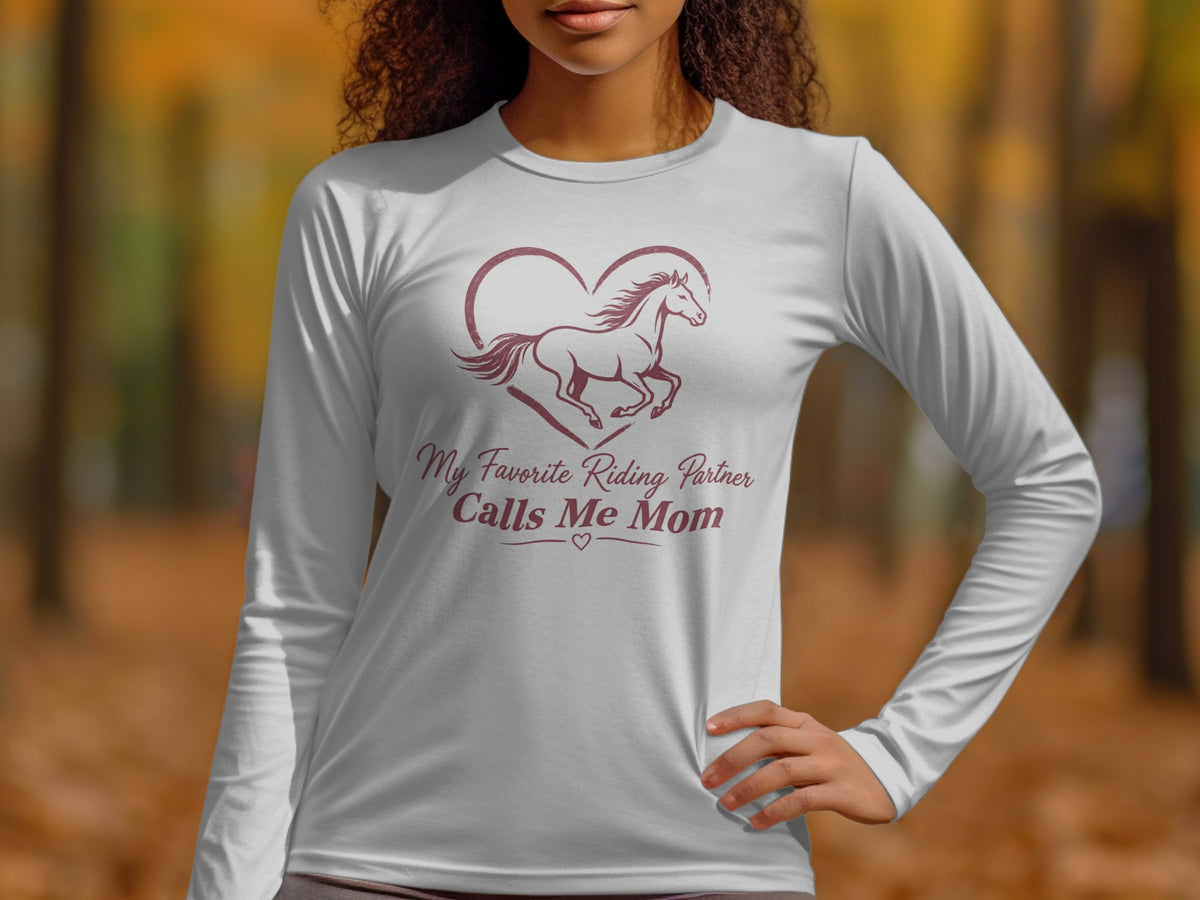 White long-sleeved shirt with horse and heart graphic, text "My Favorite Riding Partner Calls Me Mom".