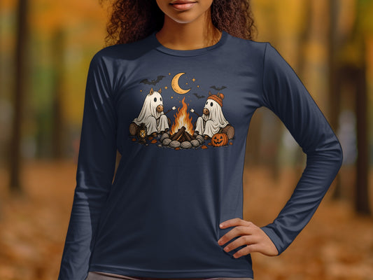 Two horses in ghost costumes roast marshmallows over a campfire under a moon and bats.