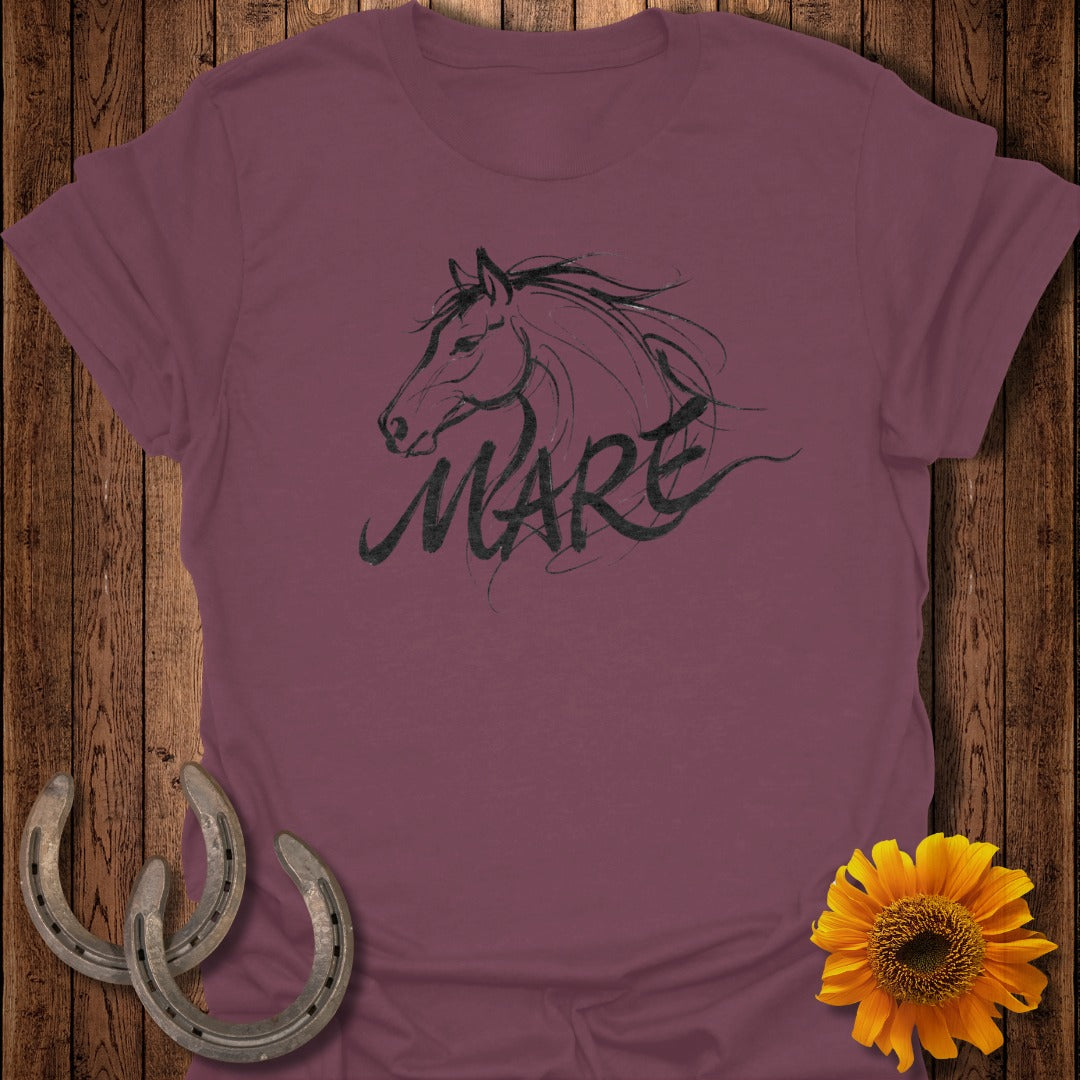 Maroon t-shirt with "MARE" text and horse silhouette, flanked by horseshoes and sunflower.
