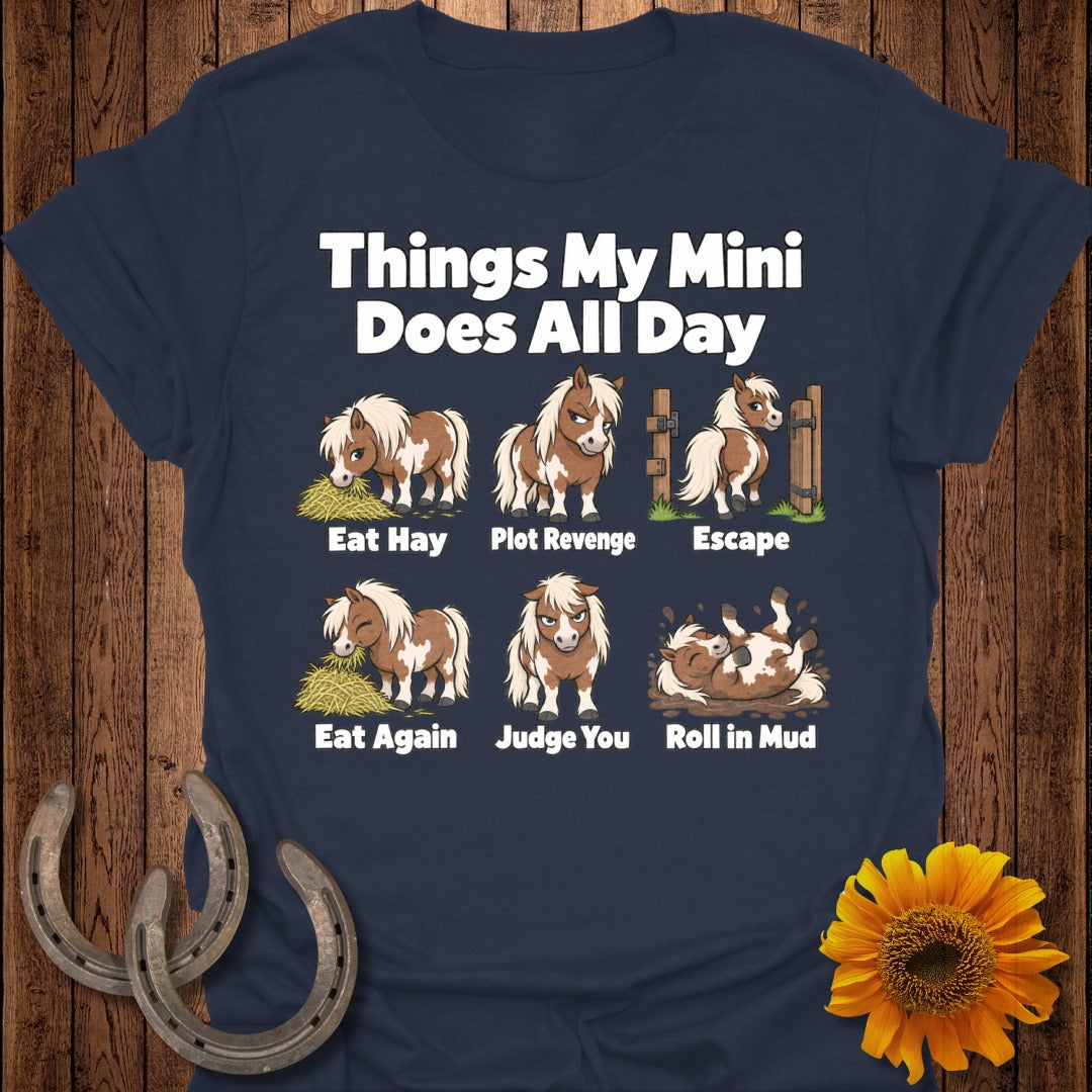 T-shirt with "Things My Mini Does All Day" text and cartoon ponies eating, escaping, and rolling in mud.