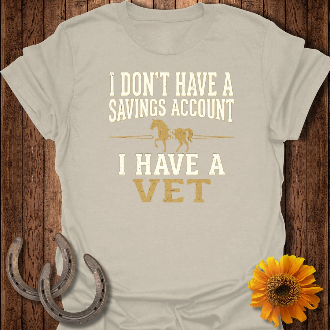 T-shirt with text "I don't have a savings account, I have a vet" and horse graphic.