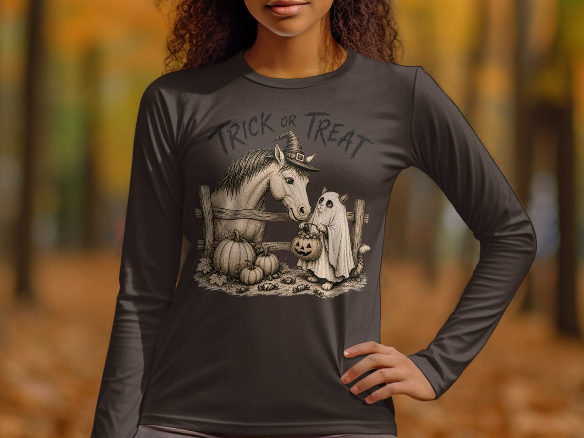 Long sleeve shirt with Halloween graphic: horse, cat in ghost costume, pumpkins, and candy.