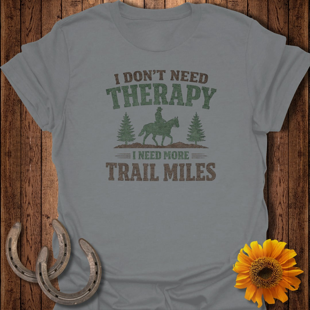 Grey t-shirt with "I DON'T NEED THERAPY I NEED MORE TRAIL MILES" and horse graphic.