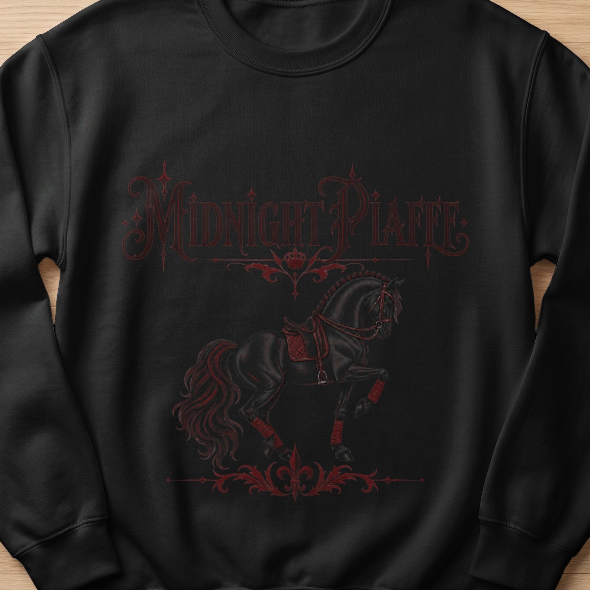 Black sweatshirt with red "Midnight Piaffe" text and a black horse.