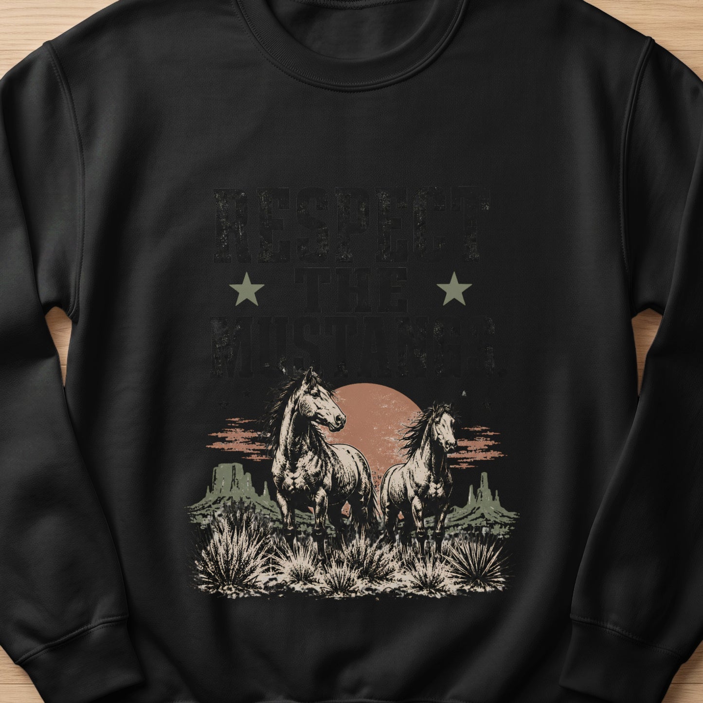 Black sweatshirt with distressed "Respect The Mustang" graphic featuring two horses in a desert landscape.