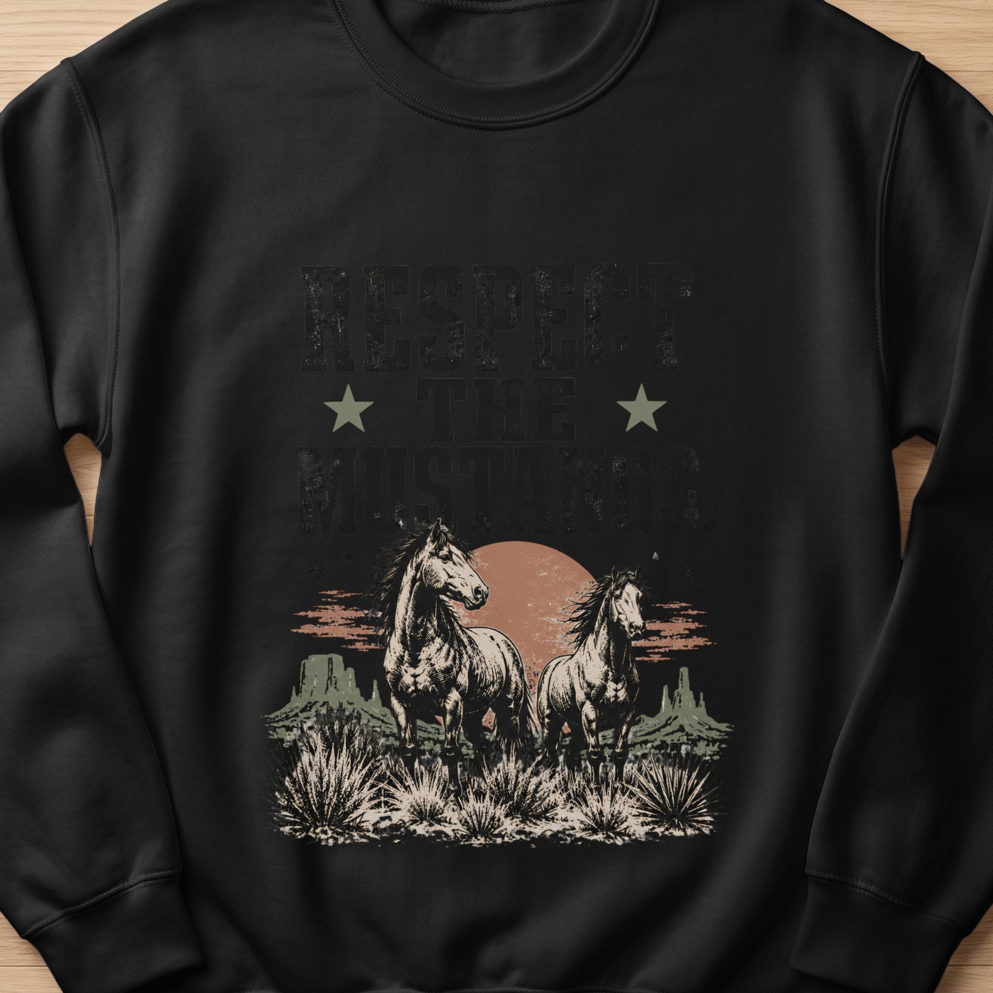 Black sweatshirt with distressed "Respect The Mustang" graphic featuring two horses in a desert landscape.