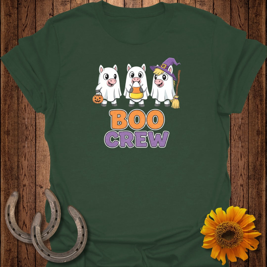 Three ghost unicorns holding a pumpkin, candy corn, and broom with "BOO CREW" text.