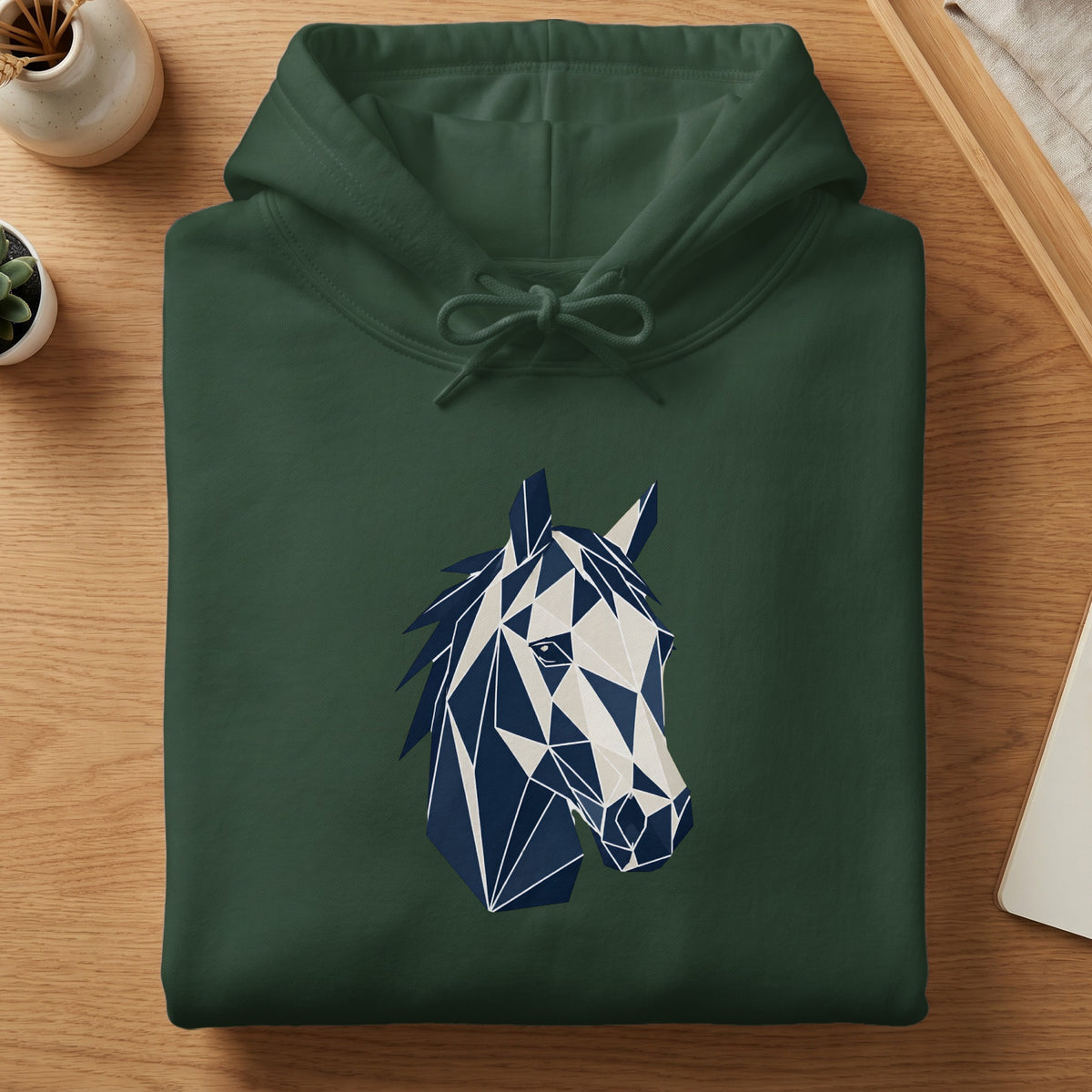 Dark green hoodie with geometric navy and cream horse head graphic.